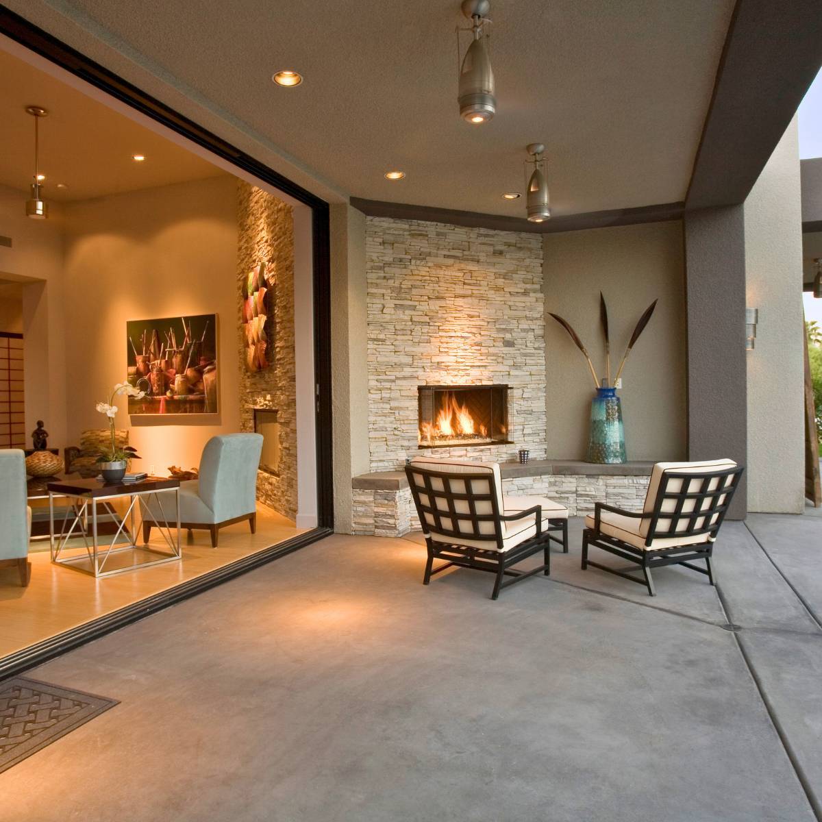 backyard patio with fireplace and large sliding patio door
