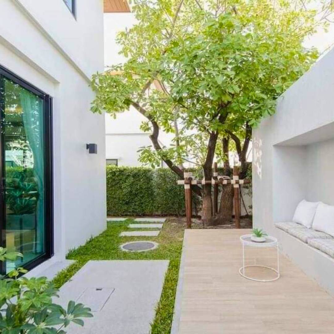 creative use of small backyard with wall with inset lounge